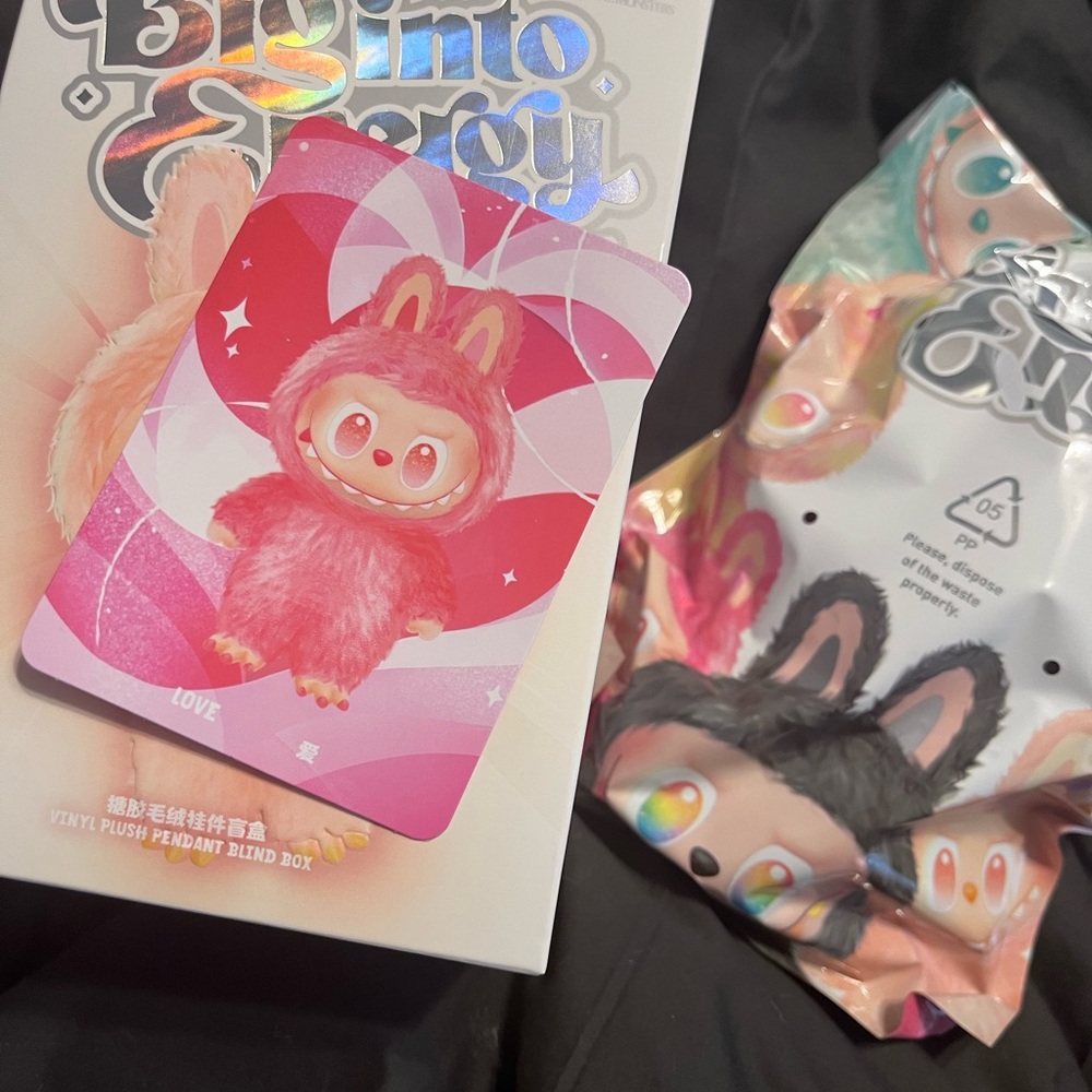 Pink and Black Plush Toy with Packaging